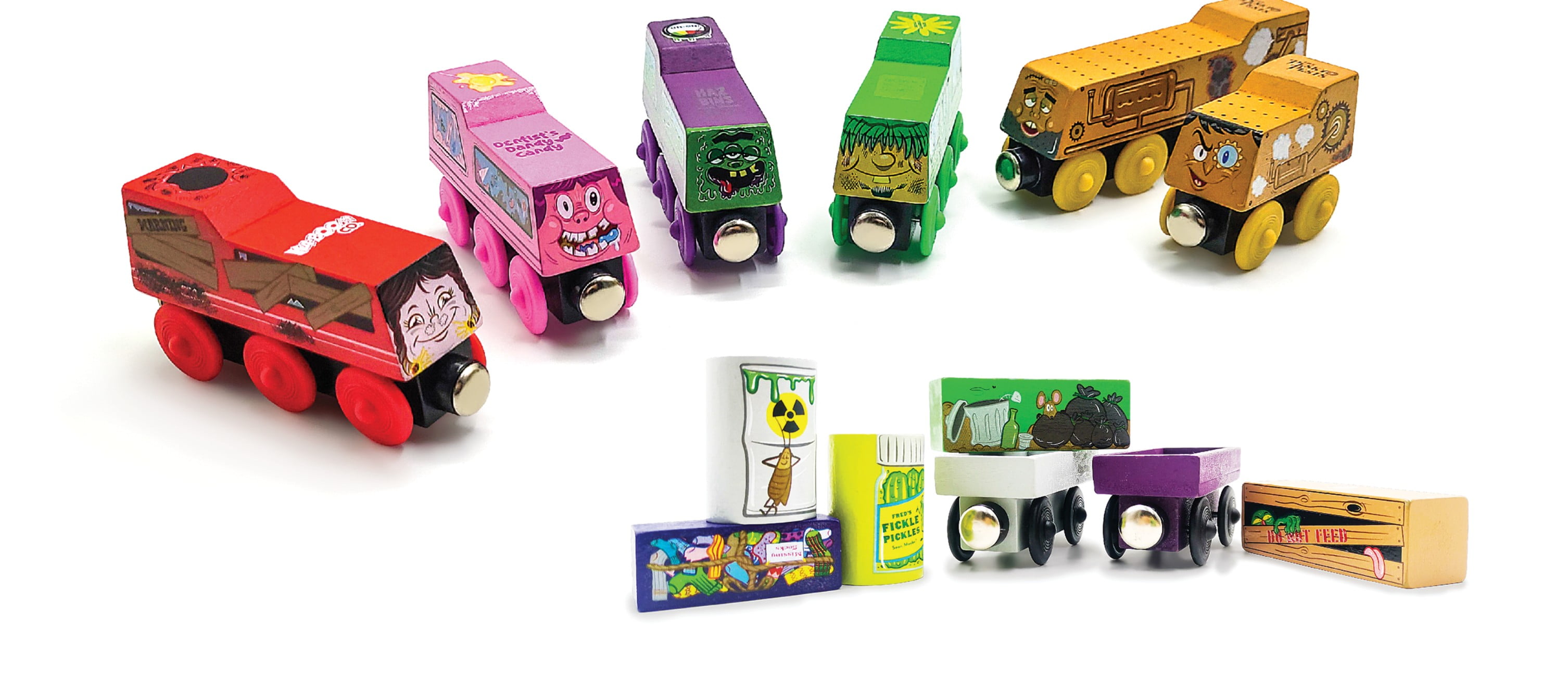 A collection of ZanyTrains™, including T.N.Theresa, a red train with pigtails; Sugar Rush Susie, a purple train with rotting teeth; Trashy Terry, a green train with a moptop; and The Pesky Pests, a twin pair of golden yellow trains